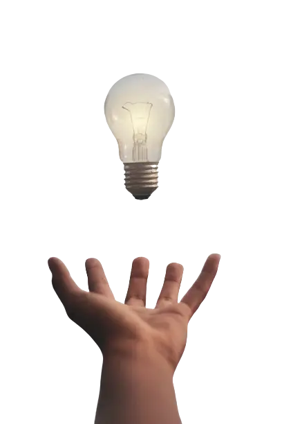 a hand holding a floating lightbulb